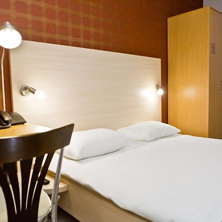 Hotel Olsi Chisinau Quarto foto